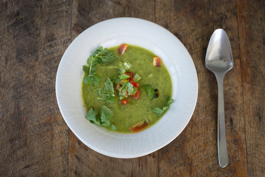Soup gazpacho on wooden table, close up