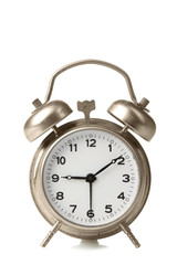 old windup loud alarm clock isolated on white background