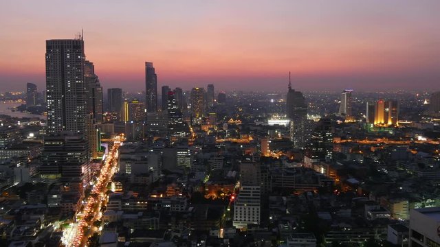 sunset twilight bangkok cityscape traffic streets roof top panorama 4k time lapse thailand

