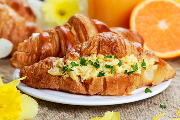Summer Morning Breakfast Croissant stuffed scrambled eggs decorated with flowers.
