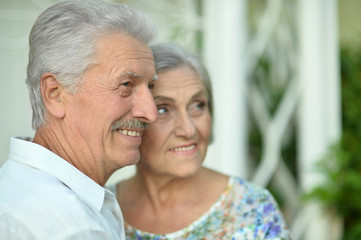 mature couple   in summer park