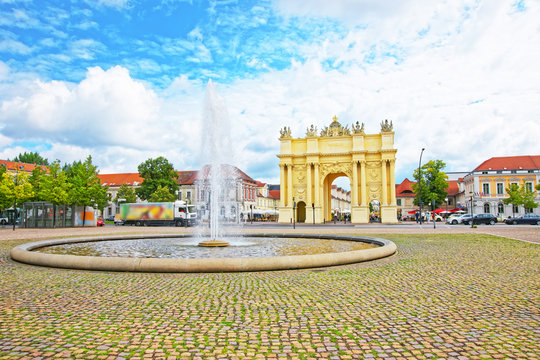 Street view on Brandenburg Gate and fountain in Potsdam