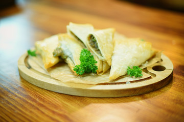 Puff pastry stuffed with parsley and mushroom