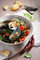 baked mussels with tomato.