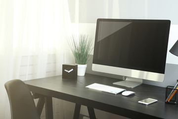 Obraz na płótnie Canvas Comfortable workplace with modern computer