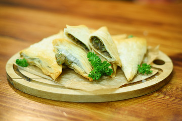 Puff pastry stuffed with parsley and mushroom