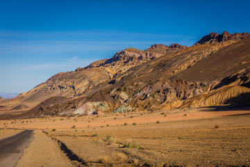 Road through canyons with lots of different topography and lots of colors. Artist's Drive, Death Valley National Park