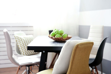 Modern room interior with table and chairs