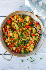 stewed pieces of vegetables in a frying pan