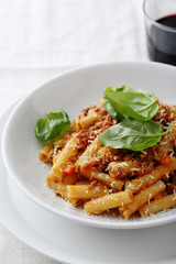 italian pasta with bolognese in bowl