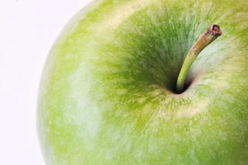 green apple close up isolated on white background