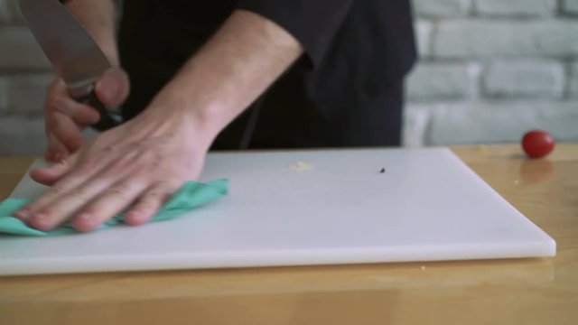 Closeup hands wiping the kitchen board 4k
