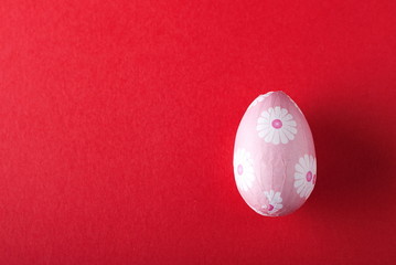 red easter egg on a red background