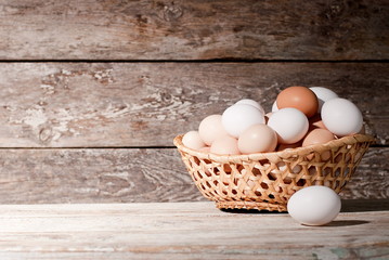 basket of eggs on the table, on the farm