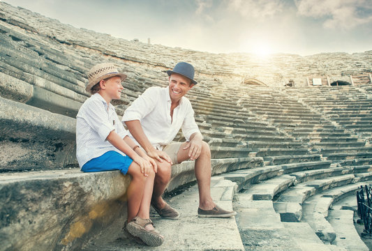 Father and son spent time together on antique ruins amphitheater