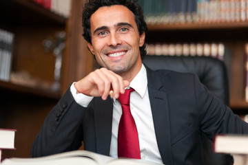 Confident lawyer in his studio 