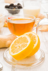 cut and tea on the breakfast table lemon