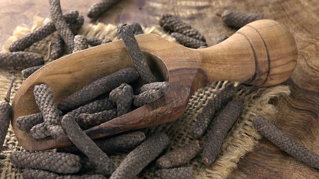 Portion of rotating Long Pepper as not loopable 4KUHD footage