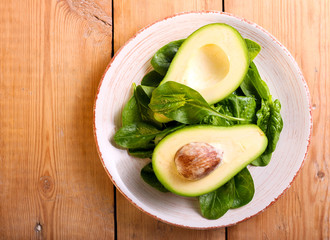 Spinach leaves and avocado