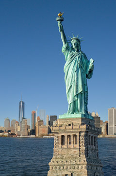 Statue of Liberty and Manhattah skyline.