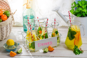 Tasty drink with orange and lemon