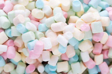 Background or texture of colorful mini marshmallows.