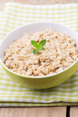 Oatmeal porridge with blueberries. healthy breakfast.