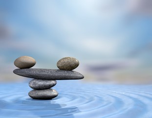 Fototapeta na wymiar Zen rocks on water blue background.