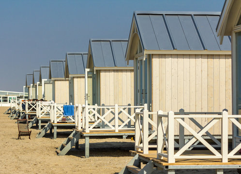Kijkduin, the Netherlands - April 4, 2016: a row of beach huts on a sunny day.