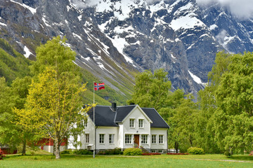 Fototapeta na wymiar Wooden country house in Romsdalen valley, Norway.