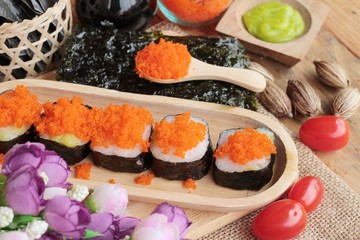 Sushi roll with shrimp eggs is delicious.