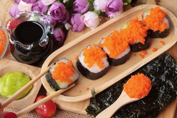 Sushi roll with shrimp eggs is delicious.
