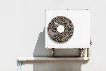 Air conditioning compressor on wall