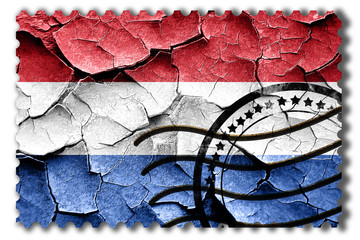 Grunge Netherlands flag with some cracks and vintage look
