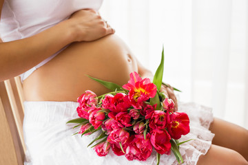 Pregnant woman with flowers