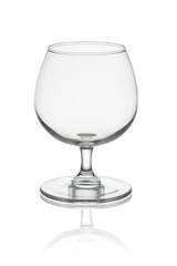 Empty whisky glass isolated on white background