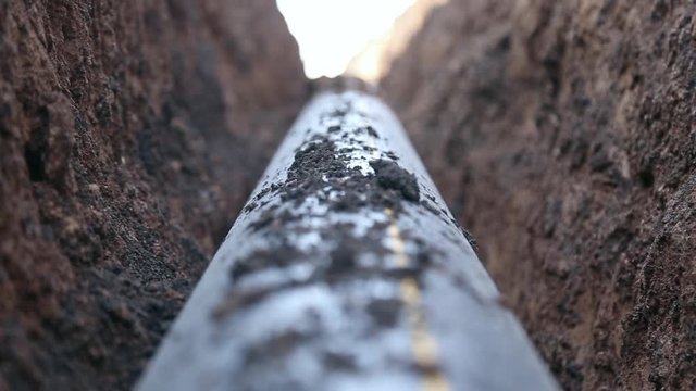 A trench with a gas  pipeline, polypropylene pipe
