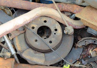Useless, worn out rusty brake discs shock absorber and other