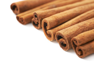 Surface covered with cinnamon sticks