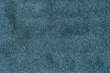 background consisting of green material fills the entire screen