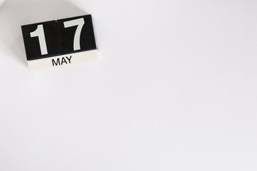 May 17th. Image of may 17 wooden color calendar on white background.  Spring day, empty space for text.  International Day Against Homophobia, IDAHOBIT