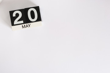 May 20th. Image of may 20 wooden color calendar on white background.  Spring day, empty space for text. World Metrology Day