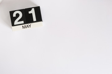 May 21st. Image of may 21 wooden color calendar on white background.  Spring day, empty space for text