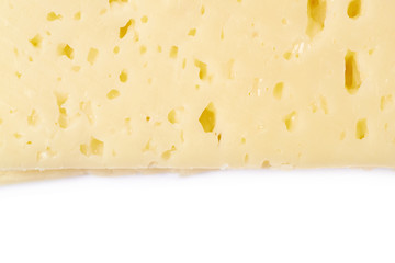 Close-up fragment of a cheese's slice