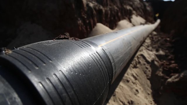 A trench with a gas  pipeline, polypropylene pipe
