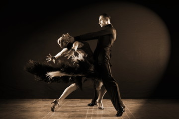 dancers in ballroom isolated on black background