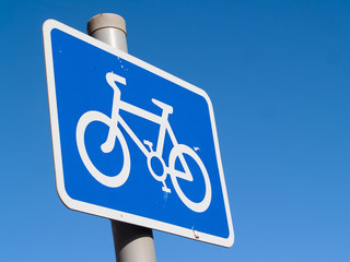 Cycle lane sign, blue, on a steel pole,  in the UK.