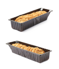 Plastic box filled with cookies isolated