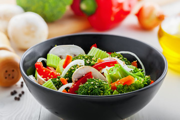 Salad in a bowl made of vegetables.  Healthy vegetarian food.