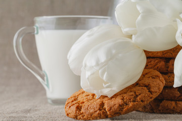 Muesli cookies and glass of milk